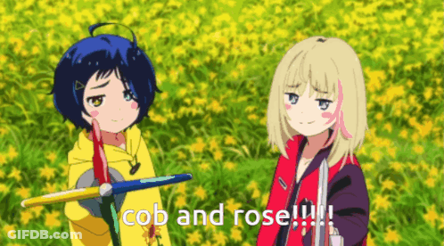 Two Anime Girls Are Standing In A Field With The Words Cob And Rose Written Below Them GIF