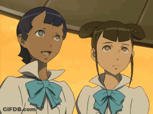 Two Anime Girls Are Standing Next To Each Other And Looking At Something GIF
