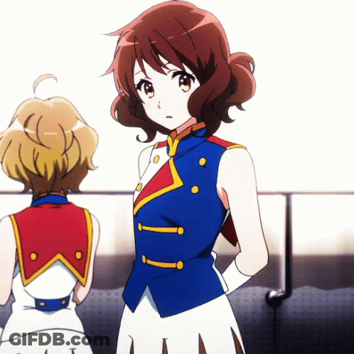 Two Anime Girls Are Standing Next To Each Other And One Has A Blue Vest On GIF