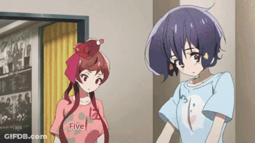Two Anime Girls Are Standing Next To Each Other And One Has A Shirt That Says Five On It GIF