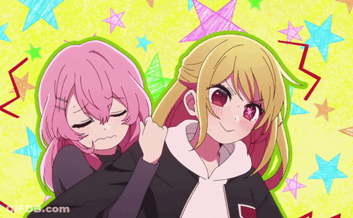 Two Anime Girls Are Standing Next To Each Other And One Has A Star On Her Forehead GIF