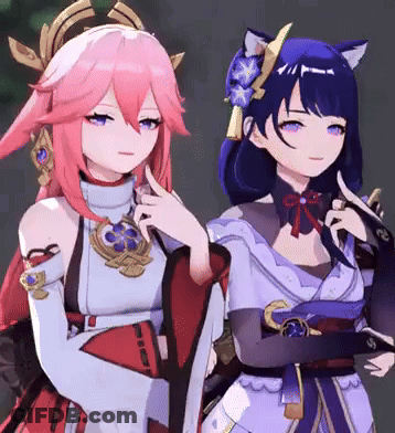 Two Anime Girls Are Standing Next To Each Other And One Of Them Has A Cat Ear . GIF