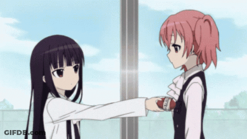 Two Anime Girls Are Standing Next To Each Other And One Of Them Is Holding Something In Her Hand That Says ' N ' On It GIF