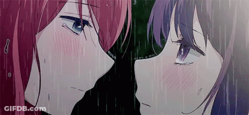 Two Anime Girls Are Standing Next To Each Other In The Rain And Kissing . GIF