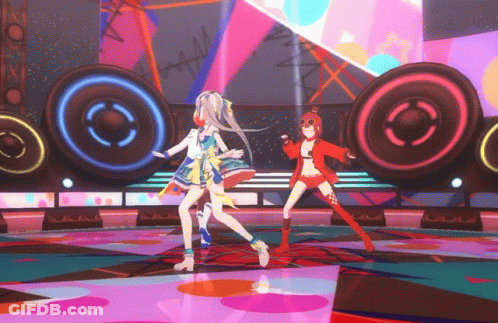 Two Anime Girls Dancing On Stage With Speakers GIF