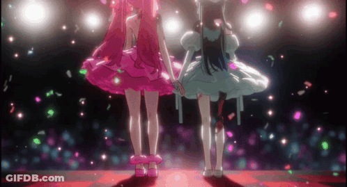 Two Anime Girls Holding Hands On Stage GIF