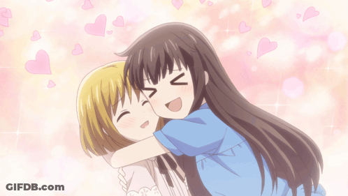 Two Anime Girls Hugging Each Other With Hearts Flying In The Background GIF