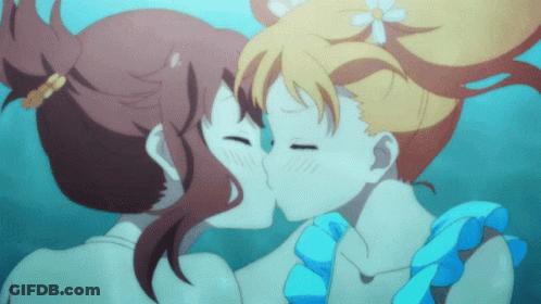 Two Anime Girls Kissing In The Water With A Flower In Their Hair GIF