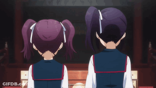 Two Anime Girls One With Crest On Chest GIF