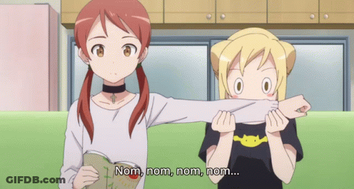 Two Anime Girls Saying Nom Nom Nom GIF