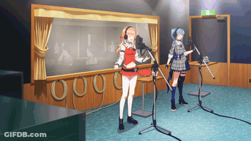 Two Anime Girls Singing Into Microphones With Green Exit Sign GIF