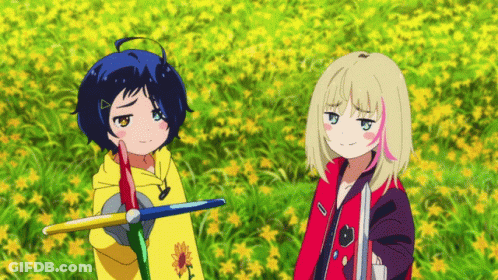Two Anime Girls Standing In A Field Of Flowers GIF