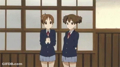 Two Anime Girls Standing In A Room GIF