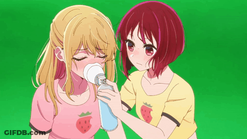 Two Anime Girls With Strawberries On Their Shirts Are Standing Next To Each Other GIF