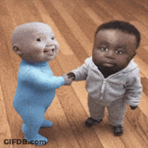 Two Babies Shaking Hands With Each Other On A Wooden Floor GIF