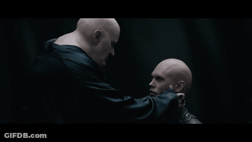 Two Bald Men One Hand On Neck GIF