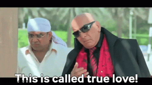 Two Bald Men One In Sunglasses And Red Shirt GIF