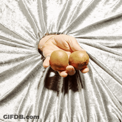 Two Balls In Open Hand GIF