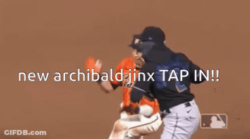 Two Baseball Players Are Standing On A Field With The Words New Archibald Jinx Tap In . GIF