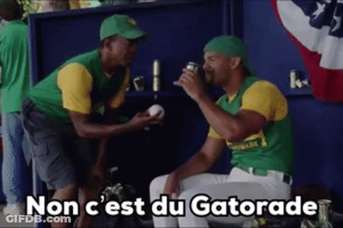 Two Baseball Players Drinking Gatorade In Dugout GIF