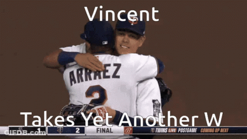 Two Baseball Players Hugging Each Other With The Words Vincent Takes Yet Another W At The Bottom GIF