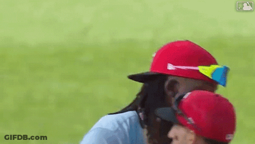 Two Baseball Players Hugging GIF