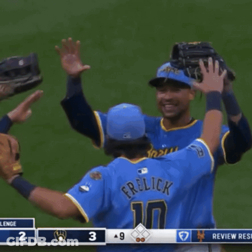 Two Baseball Players Hugging, One Number 7 GIF