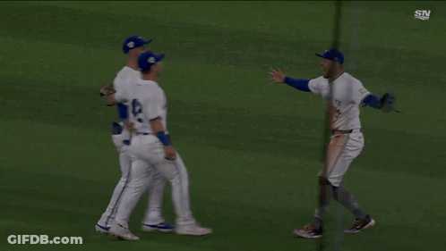 Two Baseball Players Hugging, One With 42 GIF