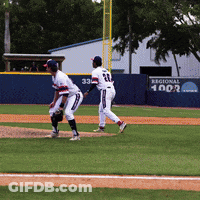 Two Baseball Players In Field With Regional 1902 Sign GIF