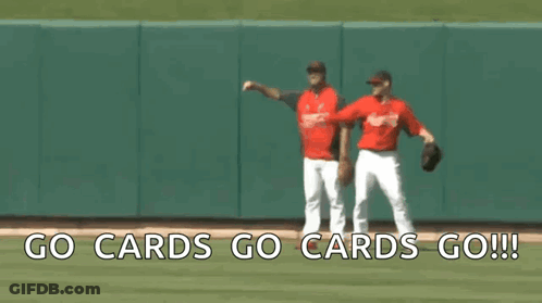 Two Baseball Players On A Field With The Words Go Cards Go Cards Go Written On The Bottom GIF