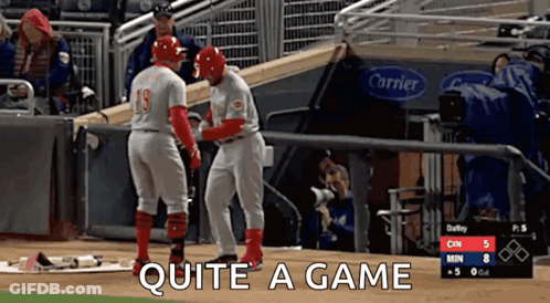 Two Baseball Players On The Field With Quite A Game Written On The Bottom GIF