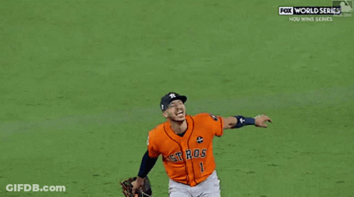Two Baseball Players One Of Whom Has The Number 27 On His Back GIF