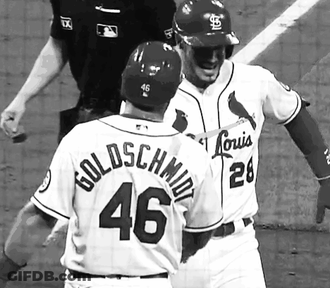 Two Baseball Players One Of Whom Has The Number 46 On Their Back GIF