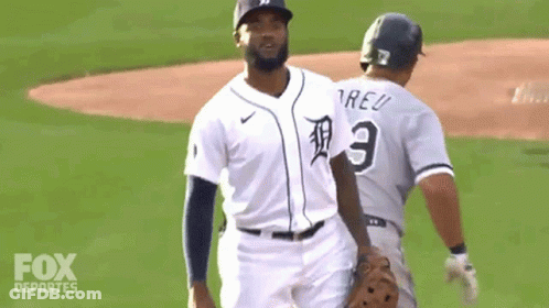 Two Baseball Players One With The Number 3 On His Jersey GIF