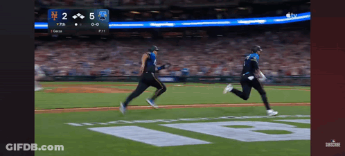 Two Baseball Players Running On Field GIF
