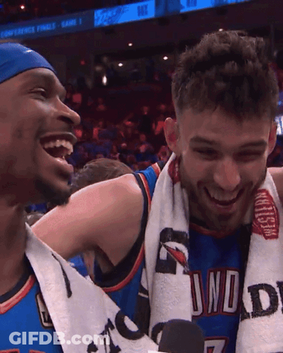 Two Basketball Players Are Laughing And One Has A Towel Around His Neck That Says Thunder GIF
