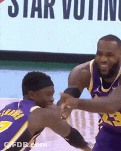Two Basketball Players Are Playing A Game And One Of Them Is Wearing A Number 23 Jersey GIF