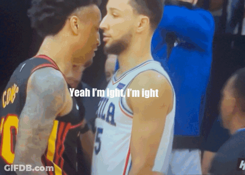 Two Basketball Players Are Standing Next To Each Other And One Of Them Has The Number 5 On His Jersey GIF