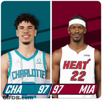 Two Basketball Players Charlotte And Heat GIF