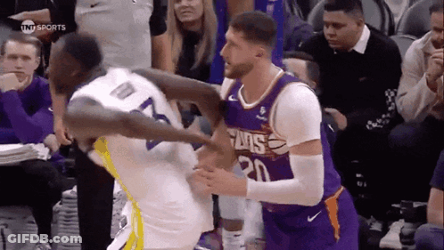 Two Basketball Players Fighting GIF