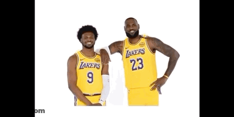 Two Basketball Players For The Lakers Are Posing For A Picture GIF