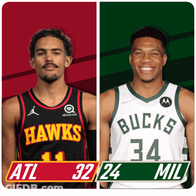 Two Basketball Players From The Hawks And The Bucks Are Standing Next To Each Other GIF
