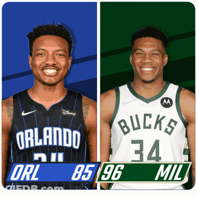 Two Basketball Players From The Orlando Magic And The Bucks Are Standing Next To Each Other GIF