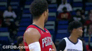 Two Basketball Players In Red And White Jerseys GIF