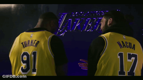 Two Basketball Players In Yellow Jerseys Number 91 And 17 GIF