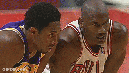 Two Basketball Players , Kobe Bryant And Michael Jordan , Are Standing Next To Each Other On The Court . GIF