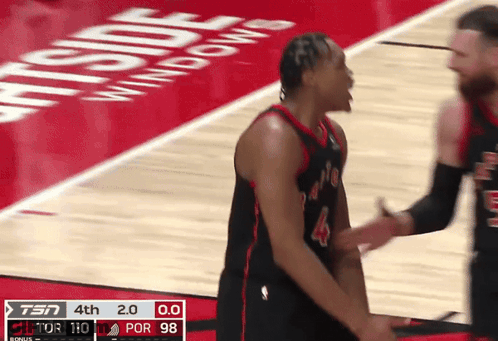 Two Basketball Players On A Court With A Scoreboard That Says Tsn 4Th 2.0 0.0 Por 98 GIF