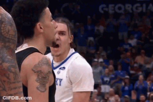 Two Basketball Players On Court One With Arm Tattoo GIF