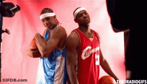 Two Basketball Players One In A Red Jersey With The Number 13 On It GIF