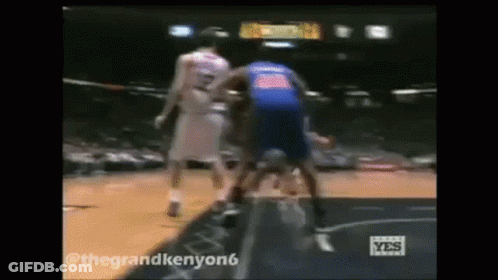 Two Basketball Players One In Blue Jersey GIF